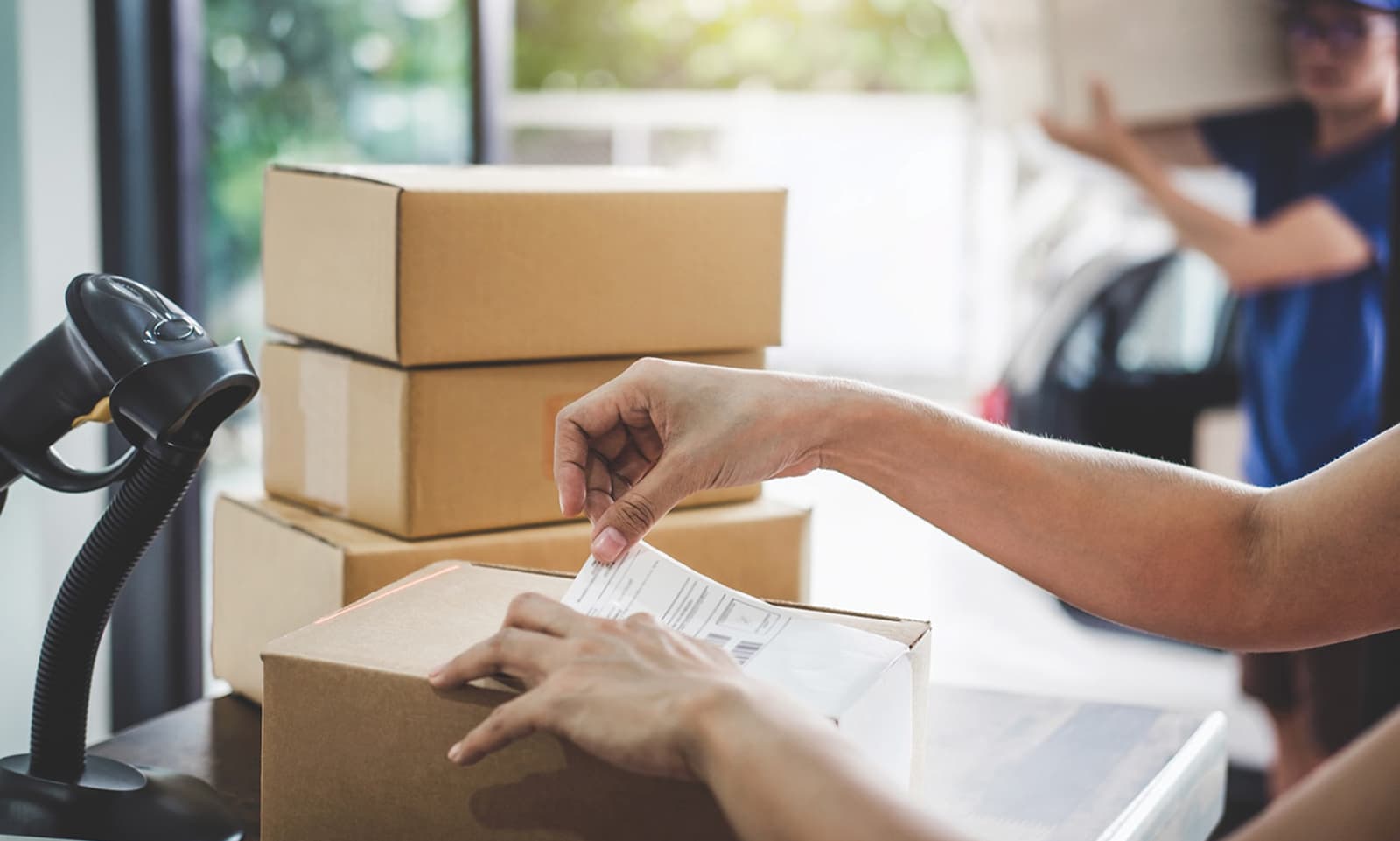 Order fulfillment operation with packages on conveyor